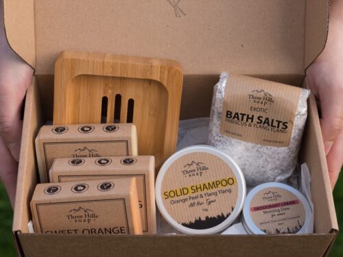 Women's natural skincare gift set with soaps and deodorant in kraft box